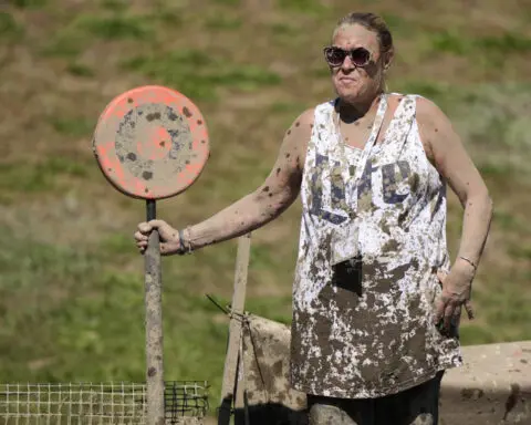 Joy in Mud Bowl: Football tournament celebrates 50 years of messy fun