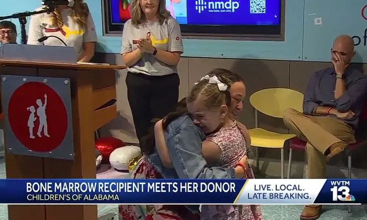 Tearful reunion: 8-year-old girl meets her bone marrow donor at Children's of Alabama Hospital