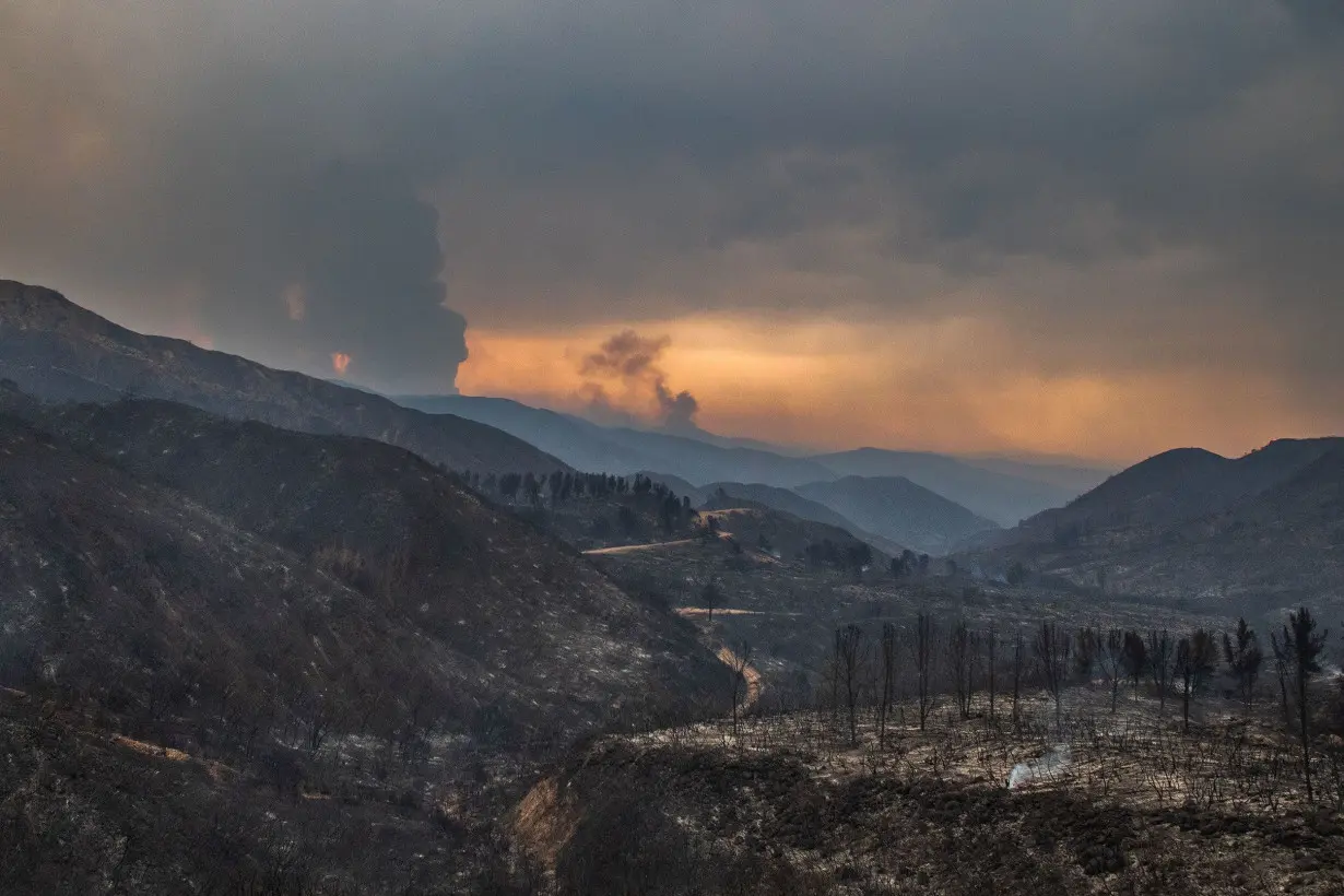 The Line Fire burns in the foothills of the San Bernardino Mountains, forcing evacuations for neighborhoods. The fire started Thursday afternoon.