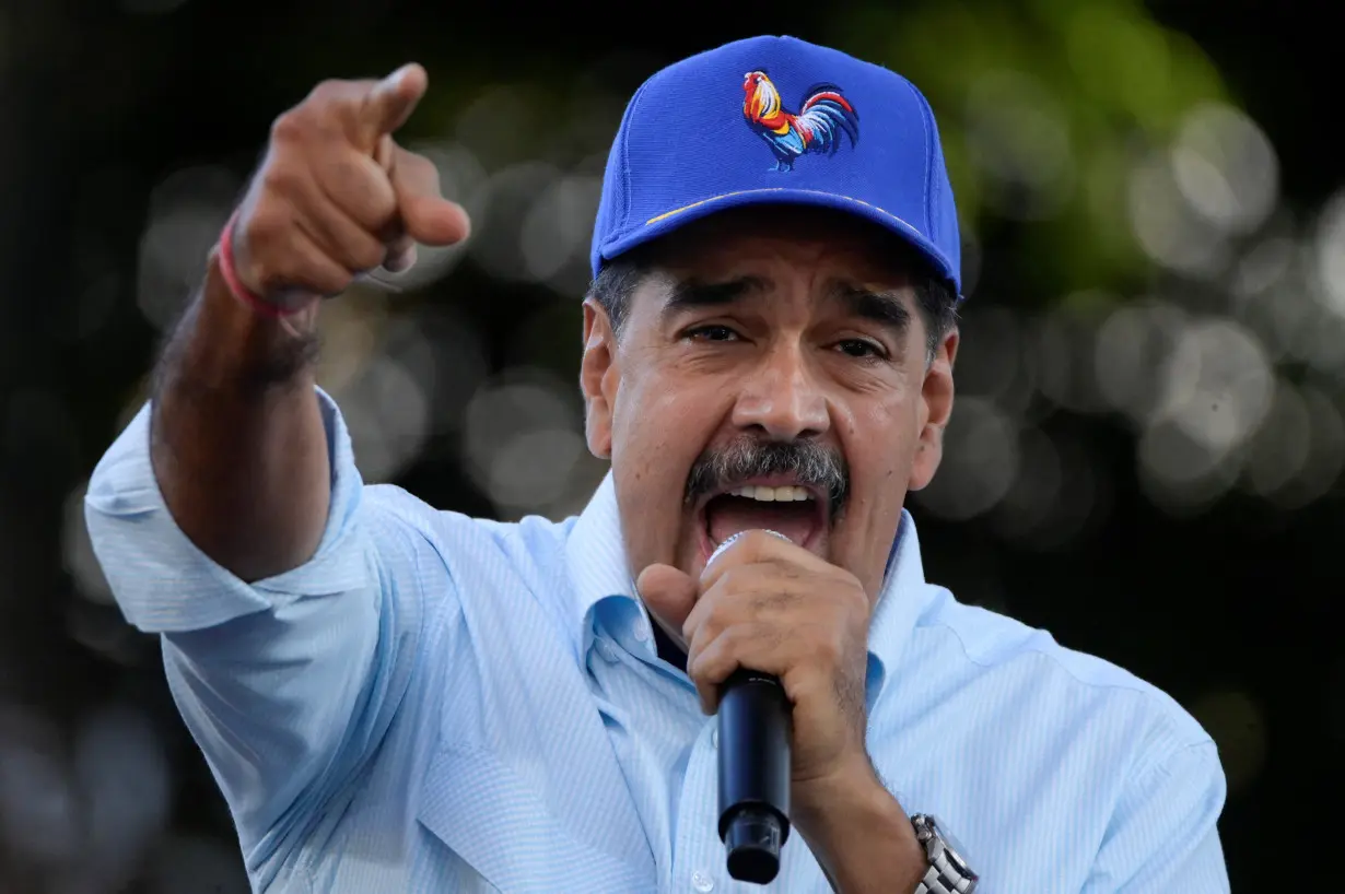 Venezuelan President Nicolas Maduro participates in a march in support of his victory in the July 28 elections, in Caracas