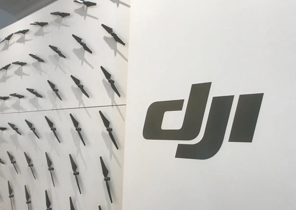 FILE PHOTO: The logo of Chinese drone maker DJI is seen at the company's office in New York