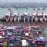 China's August exports grow a robust 8.7%, beating forecasts while imports soften