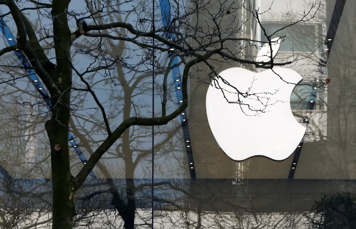 FILE PHOTO: An Apple logo is seen at the entrance of an Apple Store in downtown Brussels