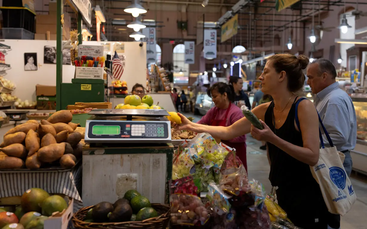 People shop at Eastern Market in Washington