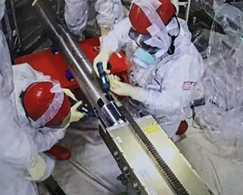 A robot has begun a 2-week mission to retrieve melted fuel from the damaged Fukushima nuclear plant