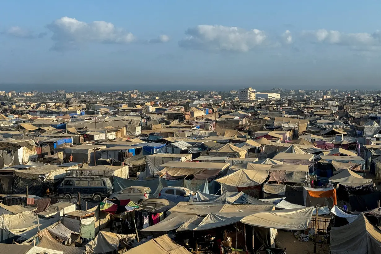 Displaced Palestinians shelter in a tent camp, amid the Israel-Hamas conflict, at the Al-Mawasi area in Khan Younis, in the southern Gaza Strip