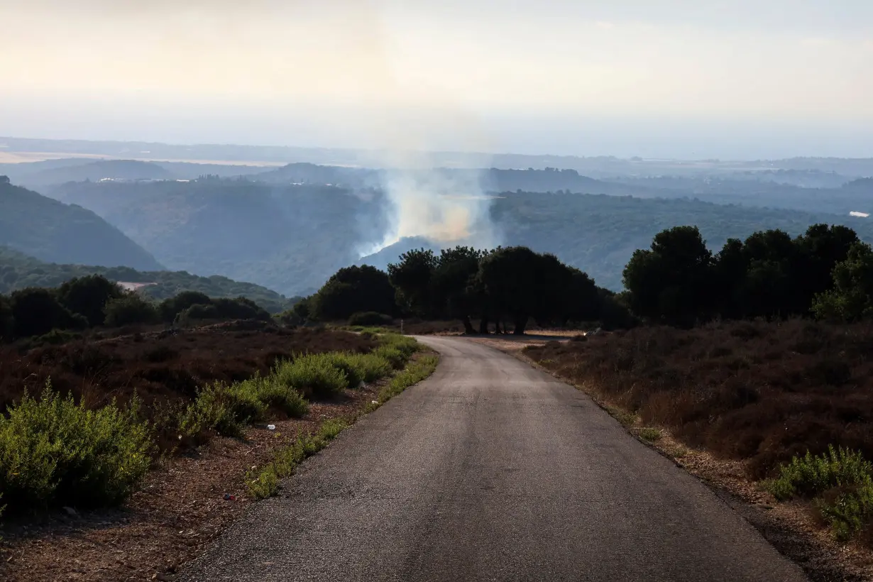 Smoke rises near the Israel Lebanon border, after Hezbollah fired projectiles towards Israel from Lebanon, amid cross-border hostilities between Hezbollah and Israeli forces, in Northern Israel