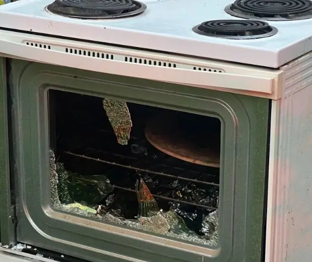 When first responders opened the oven to investigate the cause of the explosion, they found a handgun inside.