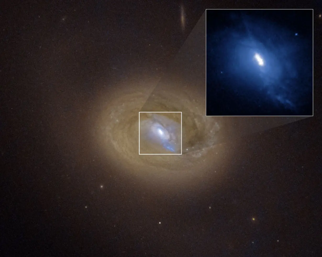 Bright lights detected by NASA telescopes lead to a dancing pair of supermassive black holes