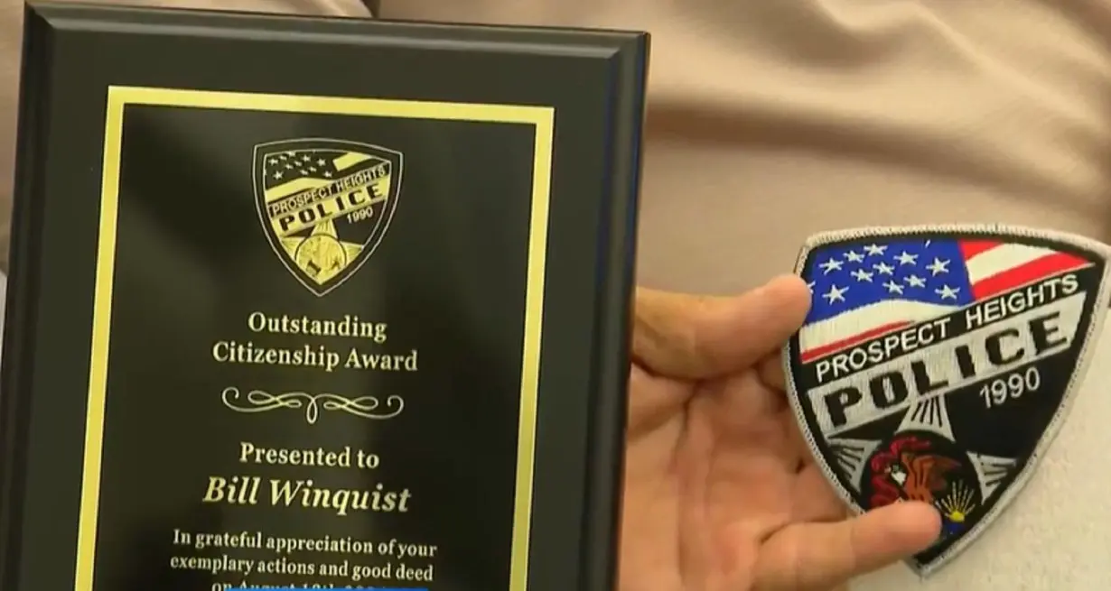 Suburban Chicago man honored by police after turning in lost wallet with nearly $6,000