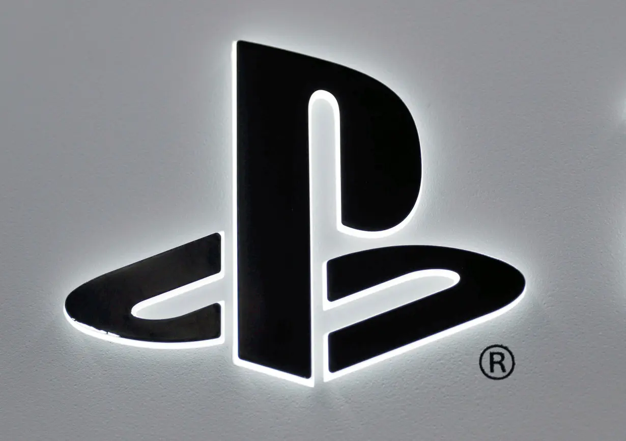 The logo of Sony PlayStation is displayed at the consumer electronics retailer chain Bic Camera in Tokyo