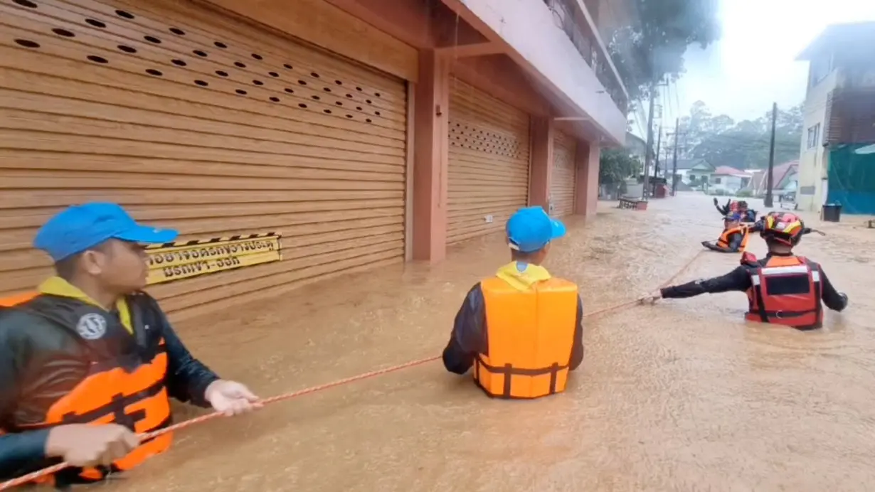 At least two dead, hundreds stranded in Thailand as floods hit north