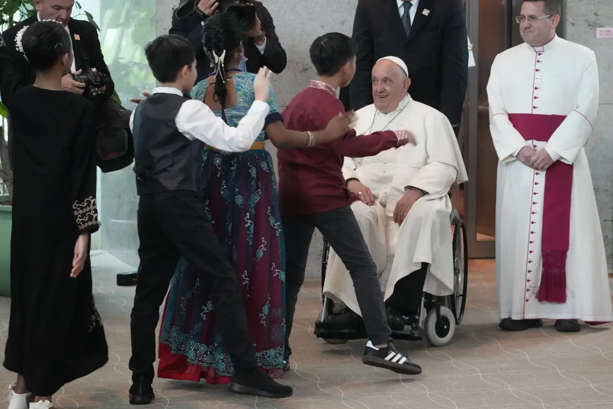 Pope travels from one of the world's poorest countries to one of the richest: Singapore