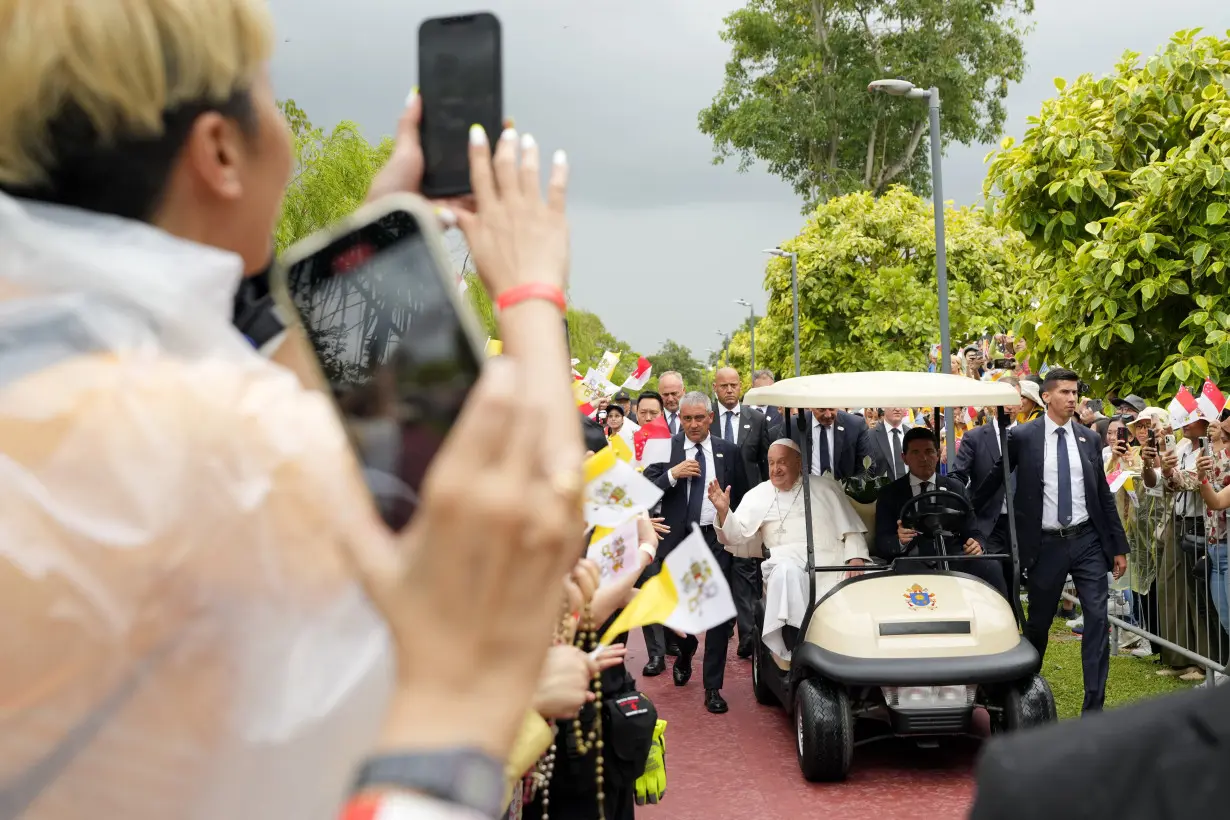 Pope travels from one of the world's poorest countries to one of the richest: Singapore