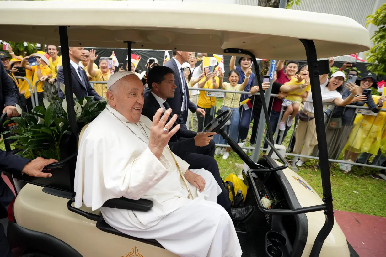 Pope travels from one of the world's poorest countries to one of the richest: Singapore