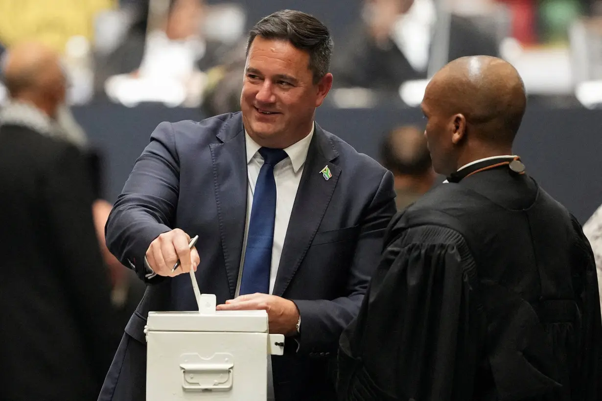 FILE PHOTO: Leader of the Democratic Alliance (DA) John Steenhuisen casts his ballot in vote for the speaker of parliament.