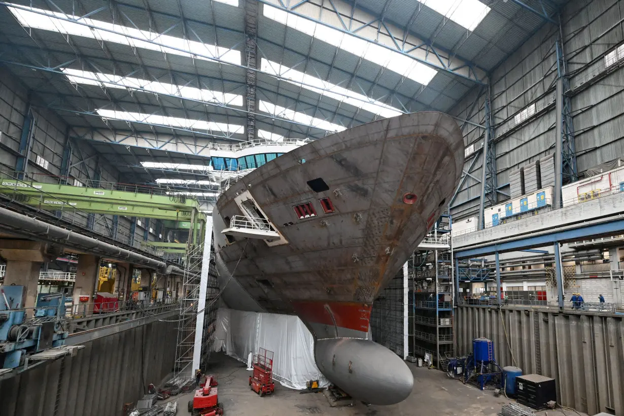 FILE PHOTO: German Chancellor Olaf Scholz visits the luxury shipbuilder Meyer Werft in Papenburg