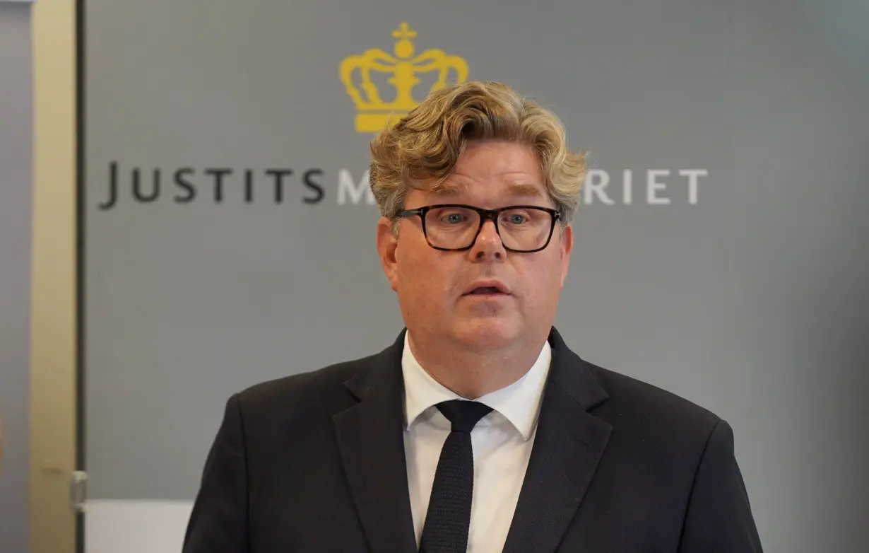 Swedish Justice Minister Gunnar Strommer speaks during a press conference in Copenhagen