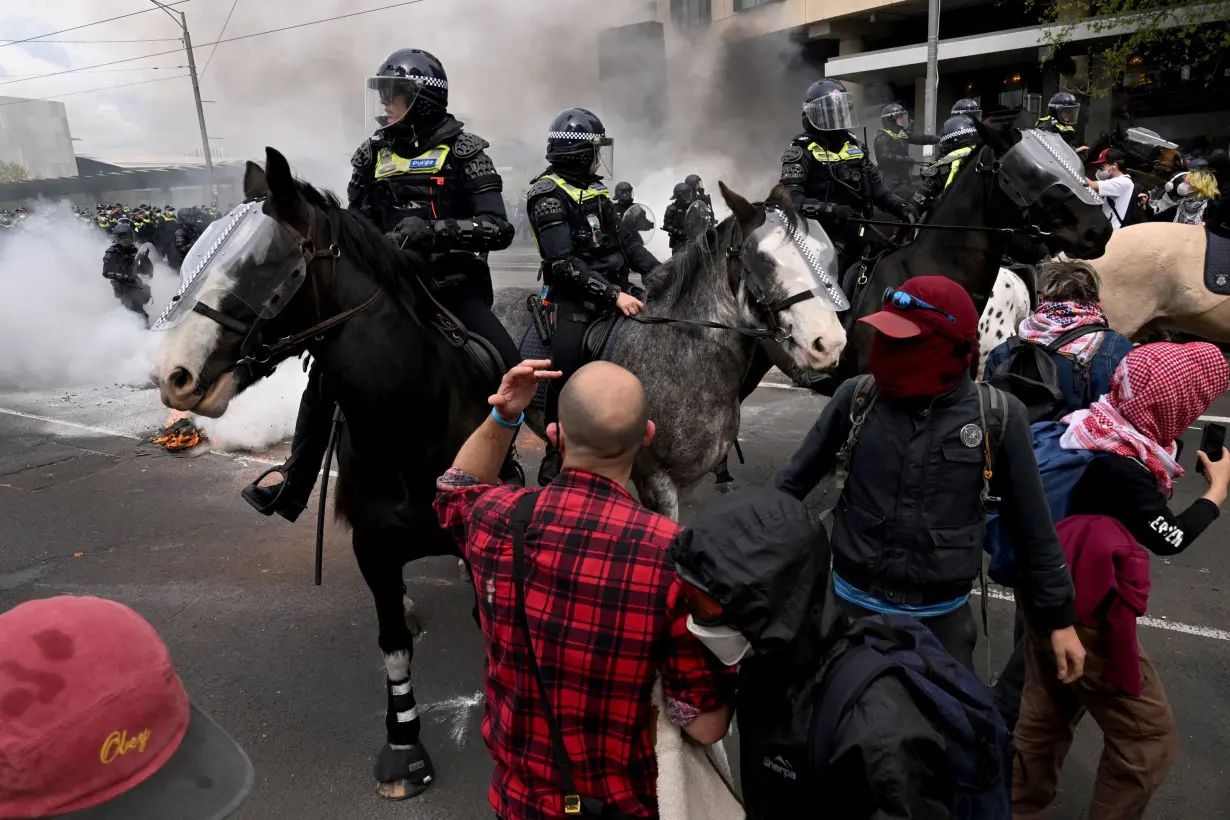 Protesters clash with police at Australia defense show