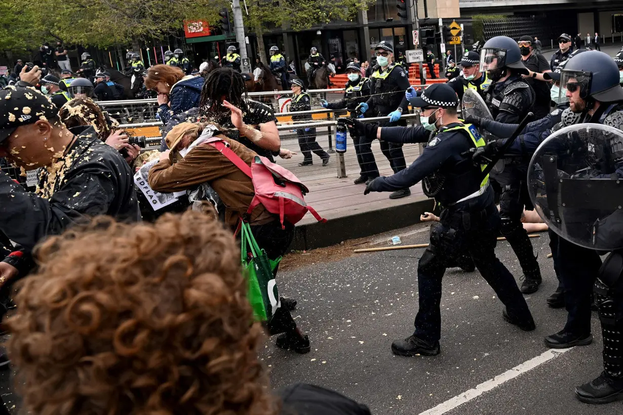 Protesters clash with police at Australia defense show