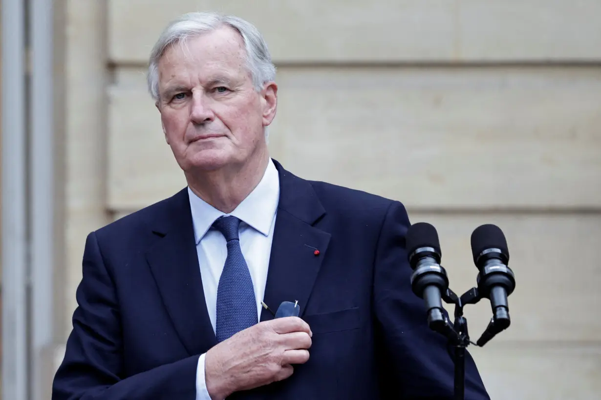 Newly appointed Prime minister Michel Barnier and Prime minister Gabriel Attal attend the handover ceremony in Paris