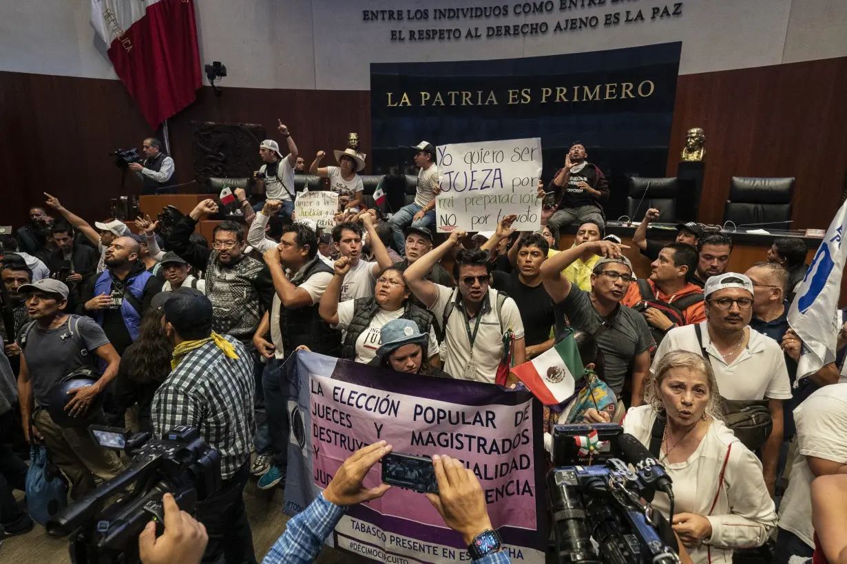 Mexico’s Senate approves a contentious judicial overhaul after protesters storm the chamber