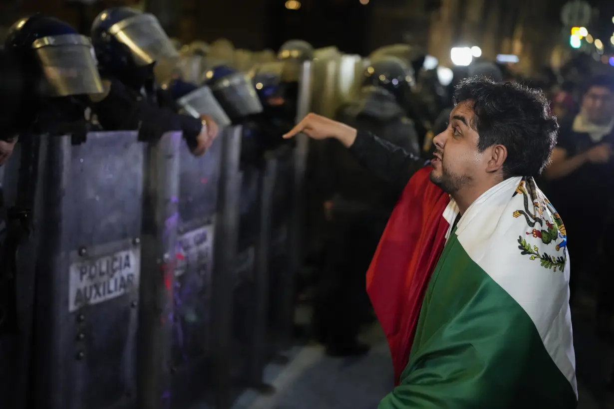 Mexico’s Senate approves a contentious judicial overhaul after protesters storm the chamber