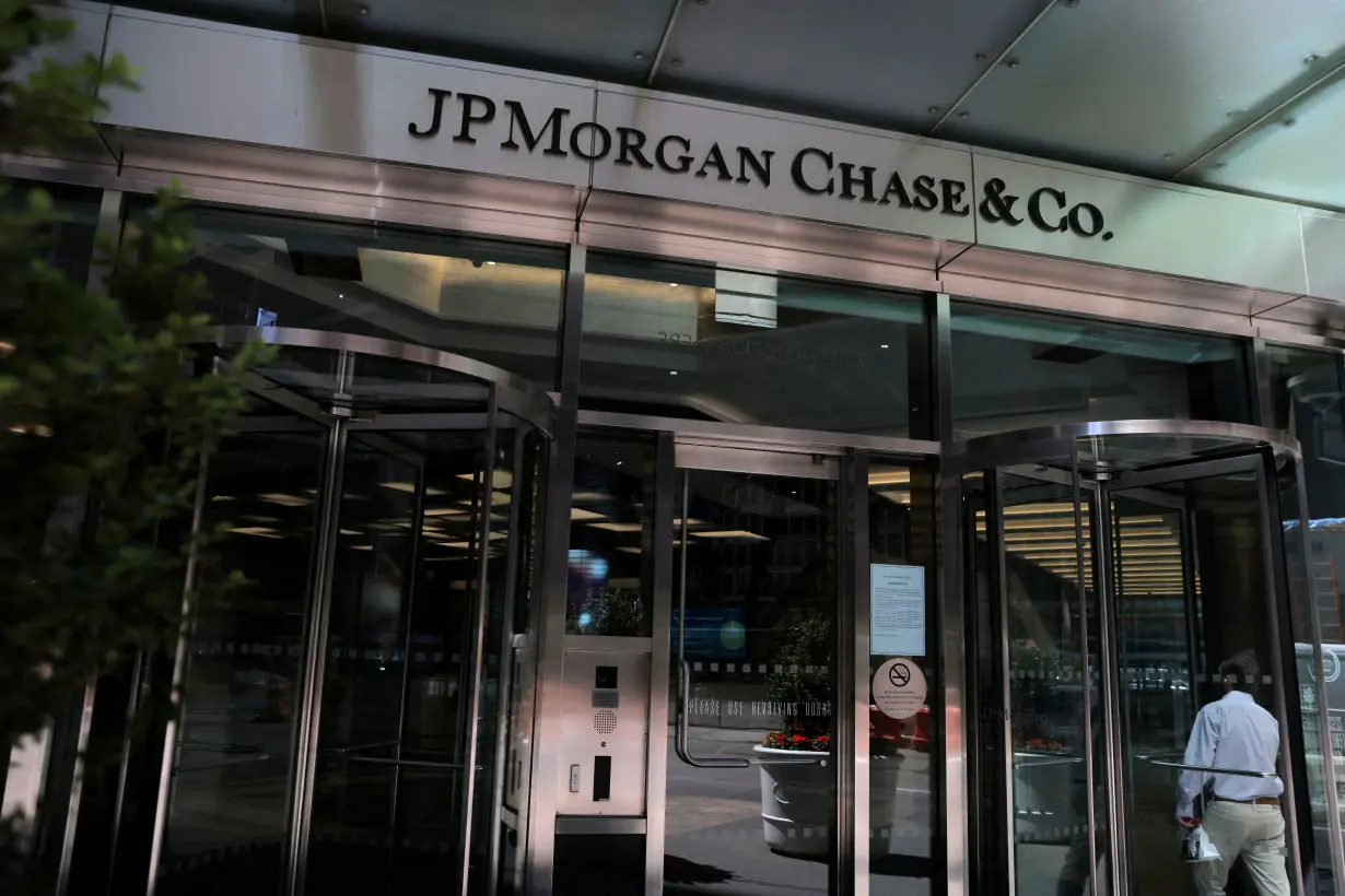 FILE PHOTO: A person enters the JPMorgan Chase & Co. New York Head Quarters in Manhattan, New York City