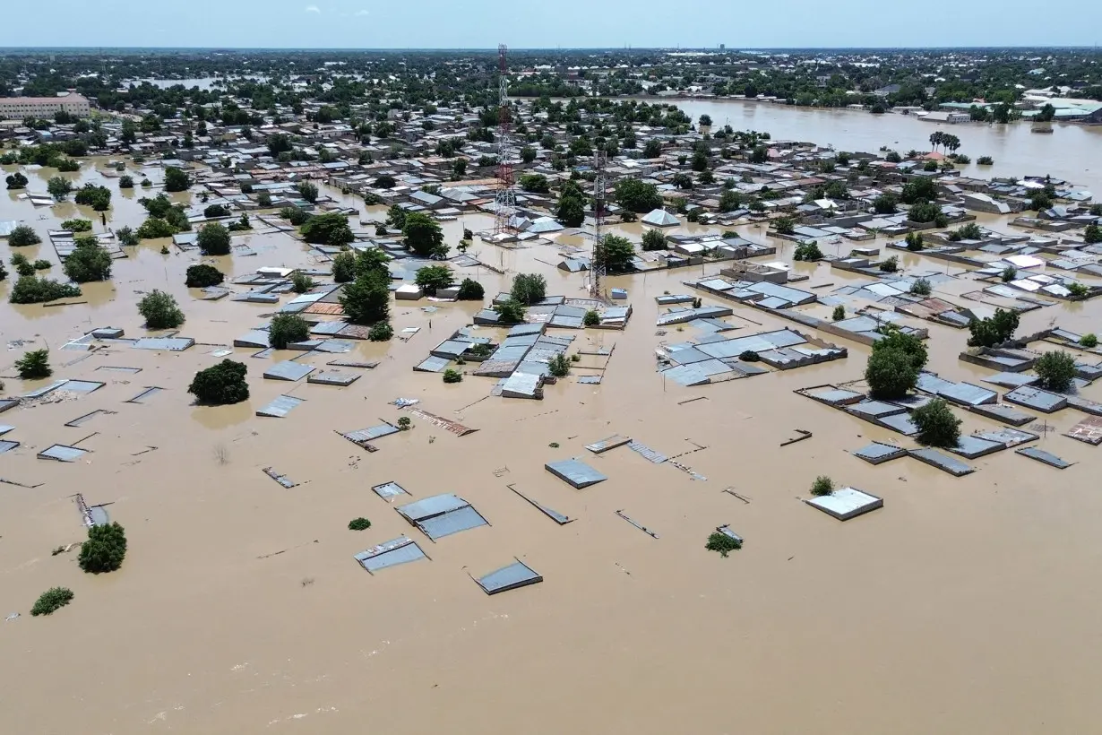 Floods gush through Nigerian zoo, sweeping snakes and crocodiles into neighborhoods