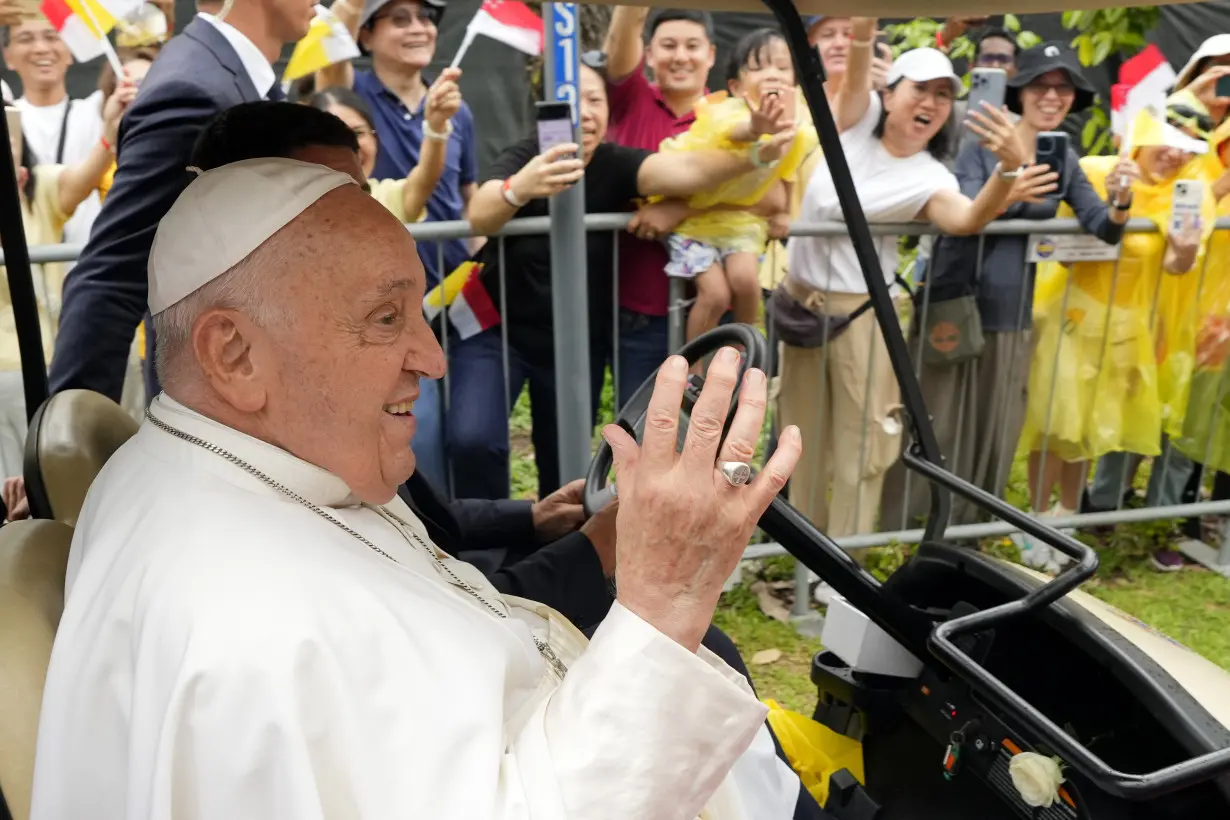 Pope travels from one of the world's poorest countries to one of the richest: Singapore