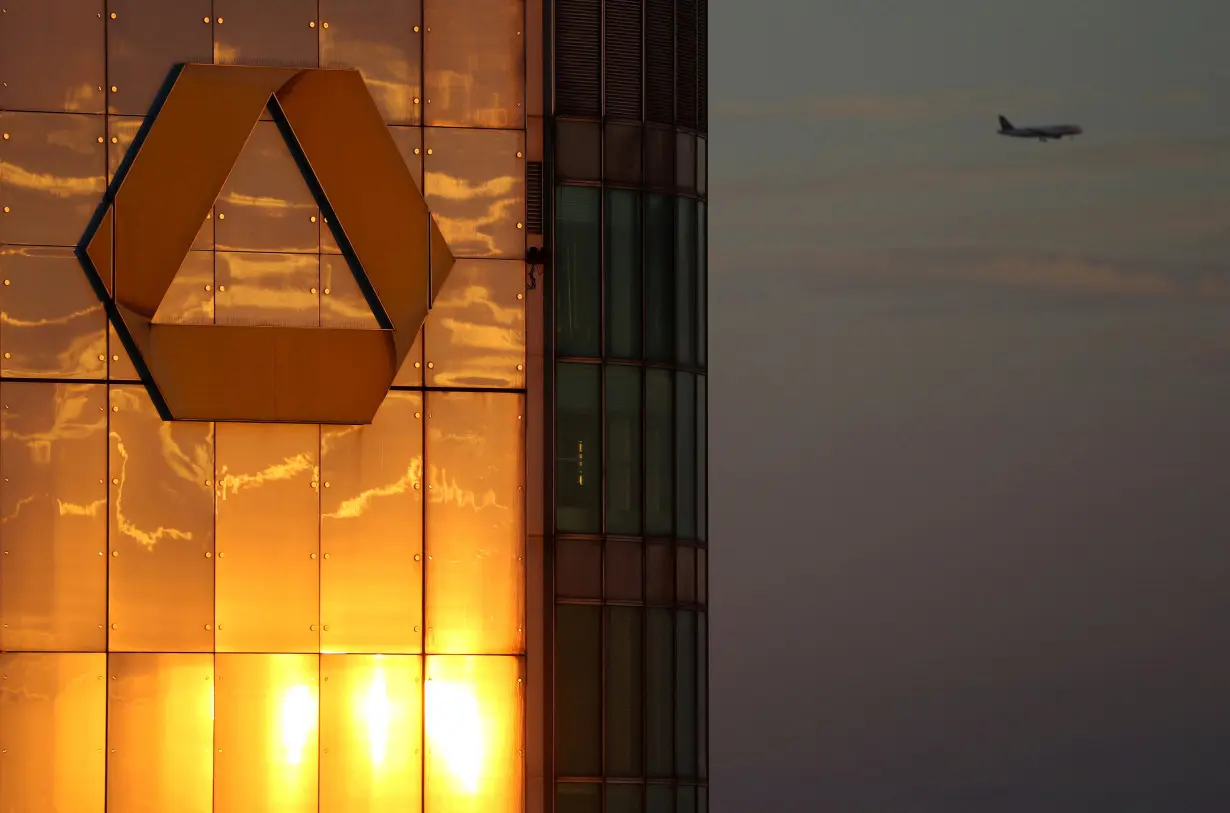 FILE PHOTO: The logo of Germany's Commerzbank is seen in the late evening sun on top of its headquarters in Frankfurt