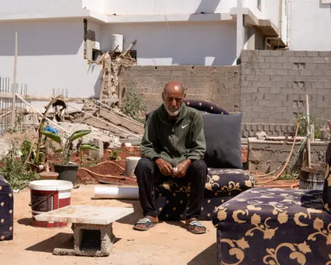 A year on, Libya flood survivors grieve for their dead