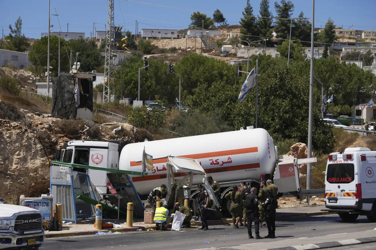 Israeli airstrikes hit UN school and homes in Gaza and kill at least 34 people, hospitals say