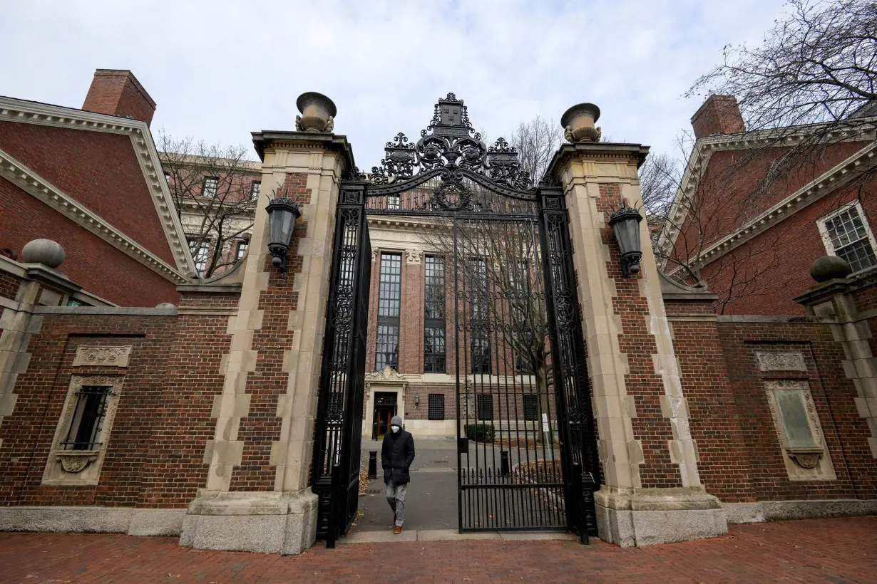 FILE PHOTO: An unidentified person is seen walking through Harvard yard