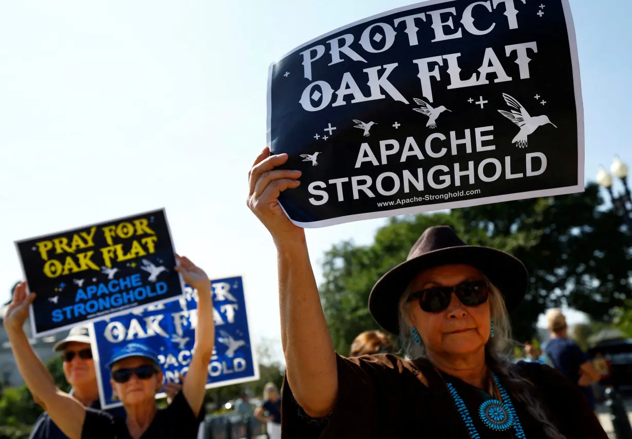 Members of the Native American group Apache Stronghold gather outside the court in Washington