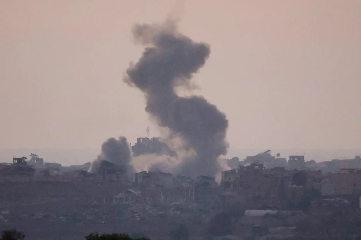 Smoke rises after an explosion in Gaza, seen from the Israel-Gaza border