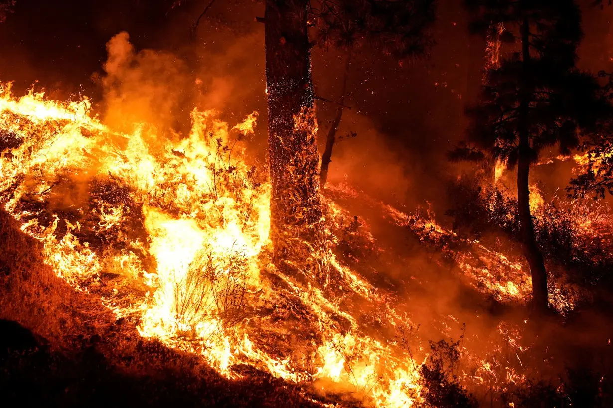 The Bridge Fire spread rapidly in Southern California September 10.