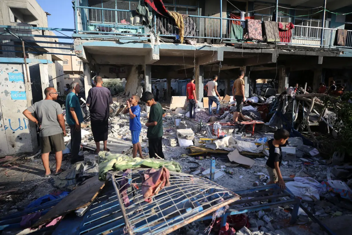 Israeli airstrike on Gaza school sheltering displaced people kills at least 18, including UN staff, Palestinian officials say