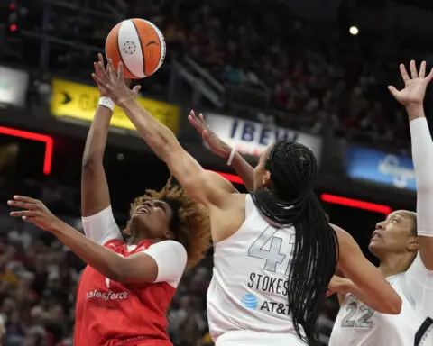 A’ja Wilson becomes the WNBA’s single-season scoring leader, Aces beat Fever for 14th straight time