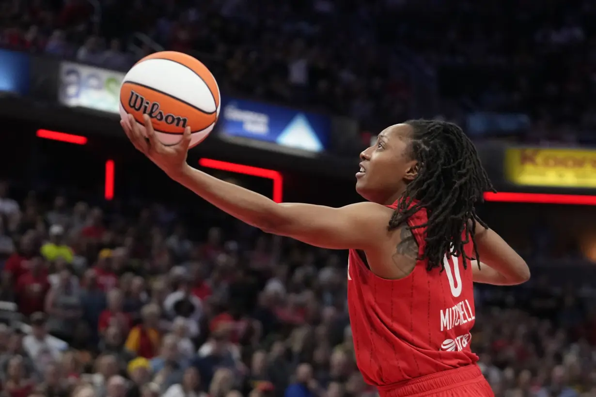 A’ja Wilson becomes the WNBA’s single-season scoring leader, Aces beat Fever for 14th straight time