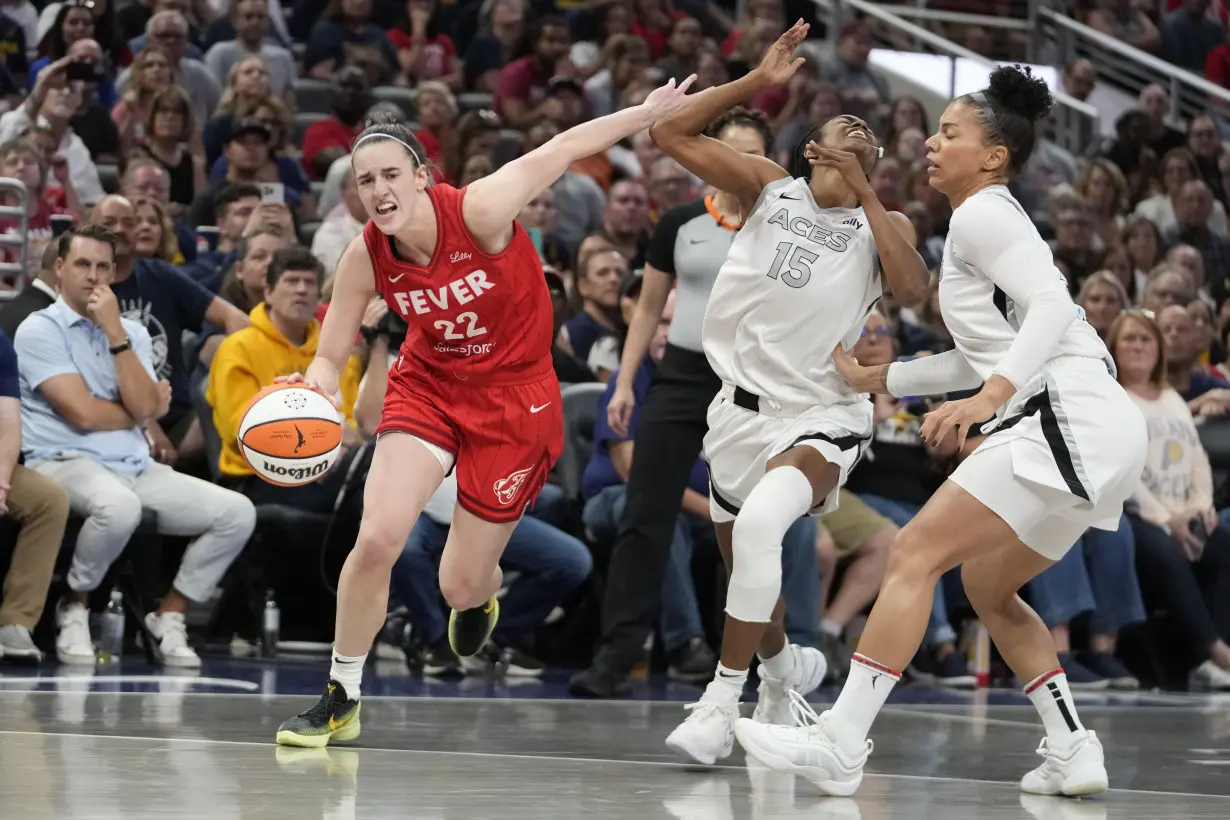 A’ja Wilson becomes the WNBA’s single-season scoring leader, Aces beat Fever for 14th straight time