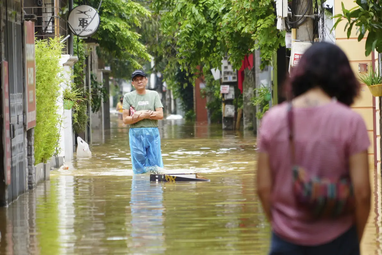 Death toll climbs to 199 in Vietnam as typhoon's aftermath brings flash floods and landslides