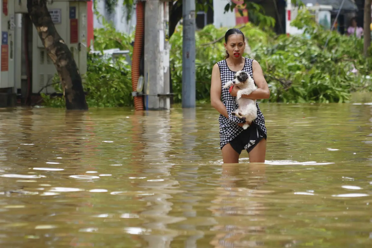 Death toll climbs to 199 in Vietnam as typhoon's aftermath brings flash floods and landslides