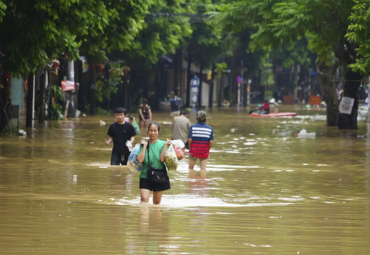 Death toll climbs to 199 in Vietnam as typhoon's aftermath brings flash floods and landslides