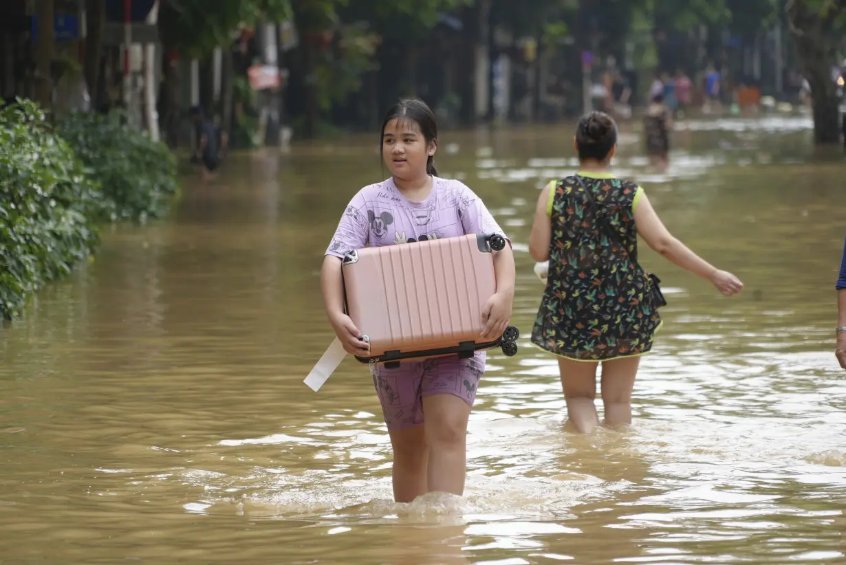 Death toll climbs to 199 in Vietnam as typhoon's aftermath brings flash floods and landslides