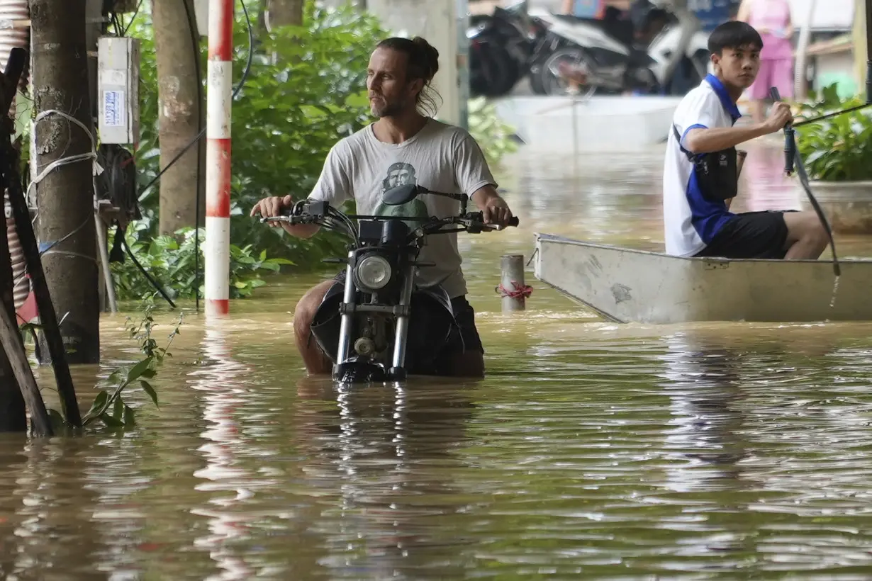 Death toll climbs to 199 in Vietnam as typhoon's aftermath brings flash floods and landslides