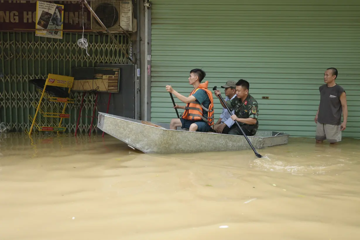 Death toll climbs to 199 in Vietnam as typhoon's aftermath brings flash floods and landslides