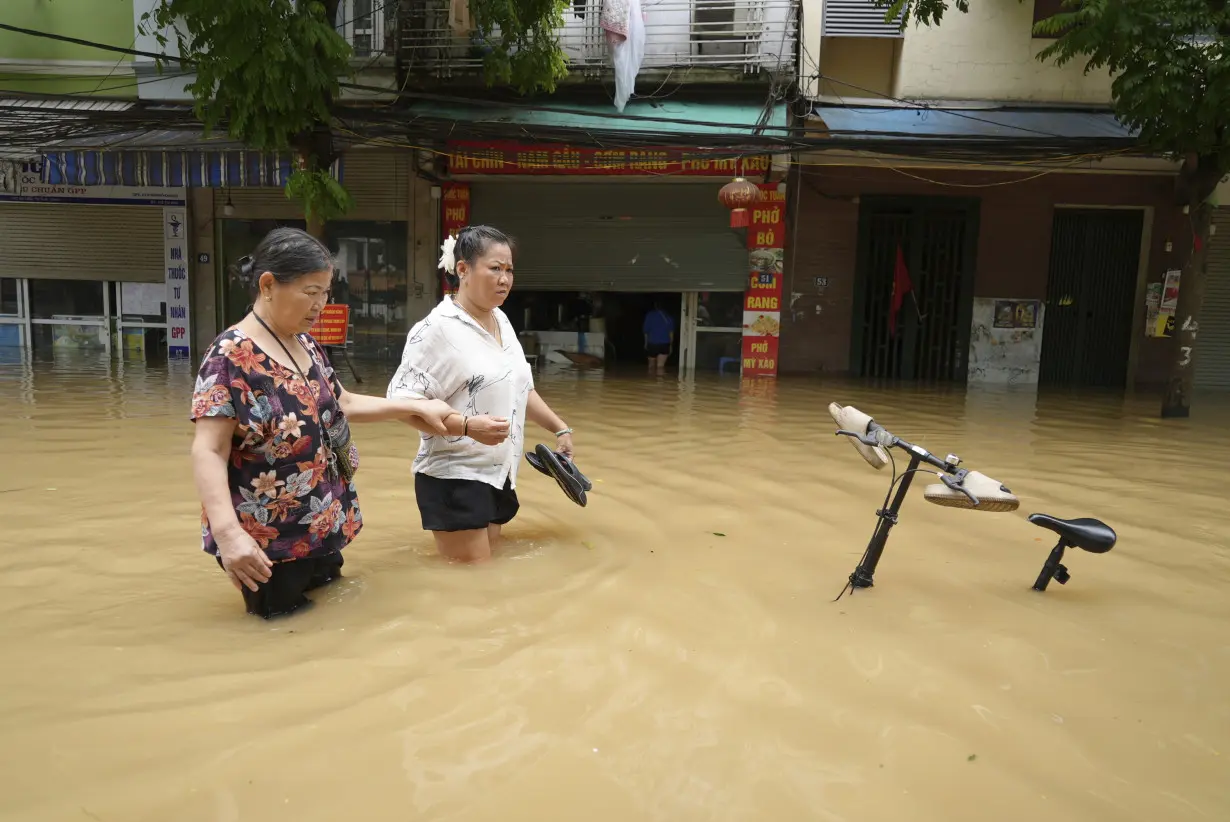 Death toll climbs to 199 in Vietnam as typhoon's aftermath brings flash floods and landslides