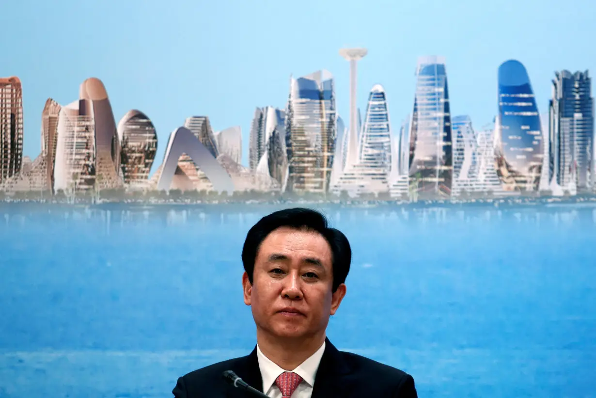 FILE PHOTO: China Evergrande Group Chairman Hui Ka Yan attends a news conference on the property developer's annual results in Hong Kong