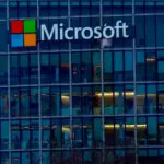 Microsoft names former GE CFO as operations chief